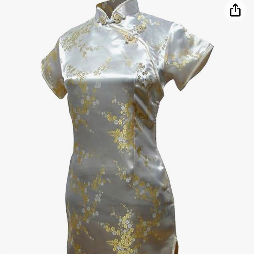 Yellow Oriental Style Dress. Zip on side of dress. Only worn once.